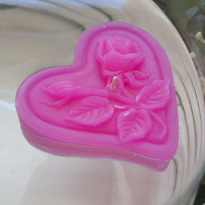 begonia pink floating heart candle with rose motif for wedding reception centerpieces