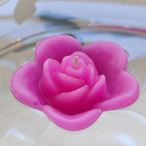 begonia colored rose shaped floating candle for wedding reception centerpieces