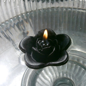 black colored rose shaped floating candle for wedding reception centerpieces