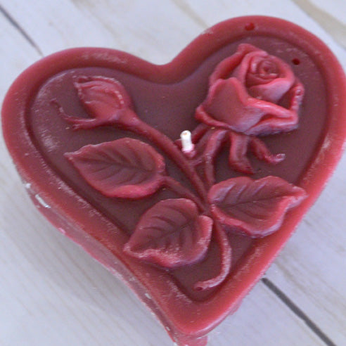 burgundy floating heart candle with rose motif for wedding reception centerpieces