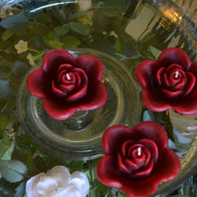 Load image into Gallery viewer, burgundy deep red colored rose shaped floating candle for wedding reception centerpieces