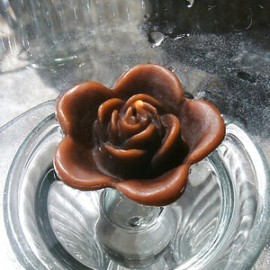 chocolate brown colored rose shaped floating candle for wedding reception centerpieces