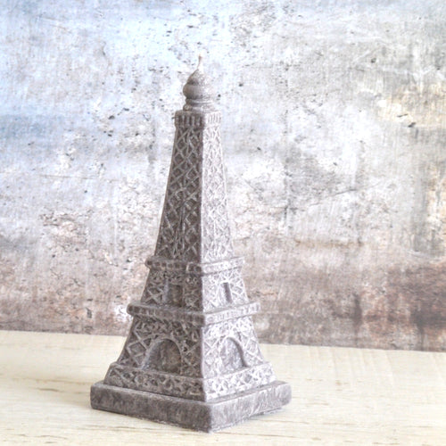 gray stone look eiffel tower shaped candle made from palm wax