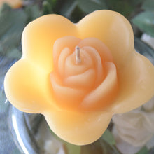 Load image into Gallery viewer, golden honey colored rose shaped floating candle for wedding reception centerpieces