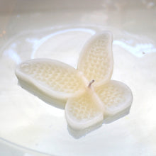 Load image into Gallery viewer, ivory or cream colored butterfly shaped floating candle for wedding reception centerpieces