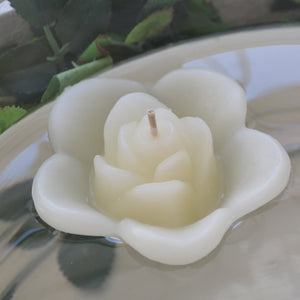 ivory cream colored rose shaped floating candle for wedding reception centerpieces