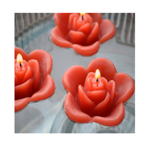 rust orange fall autumn colored rose shaped floating candle for wedding reception centerpieces