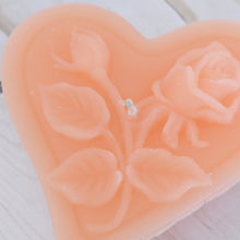 Load image into Gallery viewer, peach floating heart candle with rose motif for wedding reception centerpieces