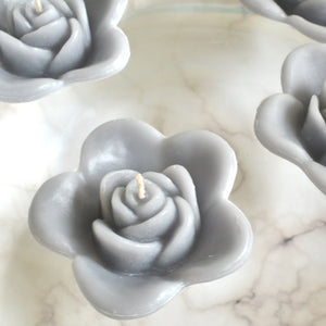 pewter gray grey colored rose shaped floating candle for wedding reception centerpieces