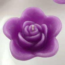 Load image into Gallery viewer, raspberry purple colored rose shaped floating candle for wedding reception centerpieces