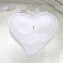 Load image into Gallery viewer, white heart shaped floating candles with rose motif for wedding reception centerpieces